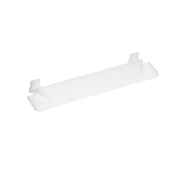 A white plastic Taylor scraper blade.