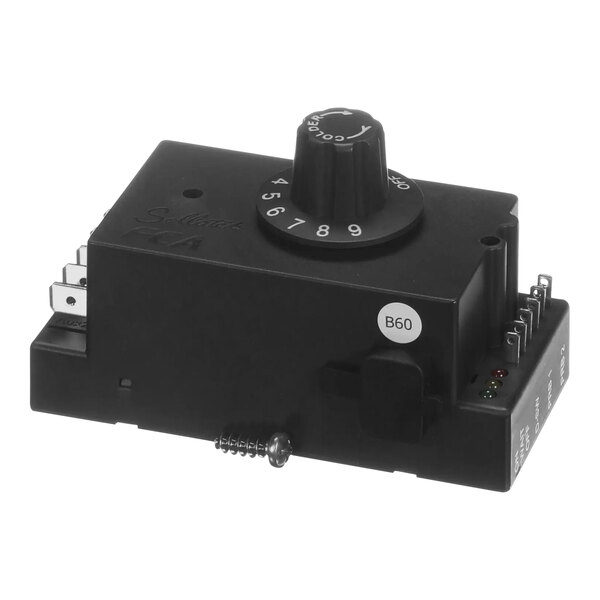A black electronic box with a dial.