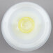 A white plastic squeeze bottle with a yellow lid with a yellow circle in the middle.