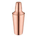 An Acopa copper cobbler cocktail shaker with a cap on.