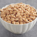 A bowl of REESE'S Peanut Butter baking chips.
